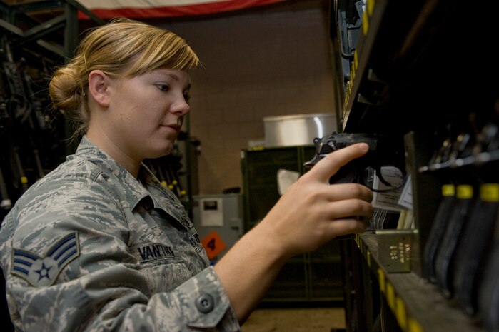 Senior Airman Tonelle Van't Hof, 99th Security Forces Squadron armory journeyman, checks the serial number on a beretta M9 pistol Aug. 13, 2012, at Nellis Air Force Base, Nev. The 99th SFS armory issues and equips security forces airmen and civilian security members that are on duty. (U.S. Air Force photo by Airman 1st Class Christopher Tam)