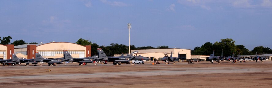F-15E Strike Eagles from the 389th Fighter Squadron, Mountain Home Air Force Base, Idaho, sit on the flightline on Barksdale Air Force Base, La., Aug. 13. The 389 FS is here to participate in exercise Green Flag. The exercise trains Airmen from different career fields to work together and prepare for deployments to combat environments. (U.S. Air Force photo/Senior Airman La'Shanette V. Garrett)(RELEASED)
