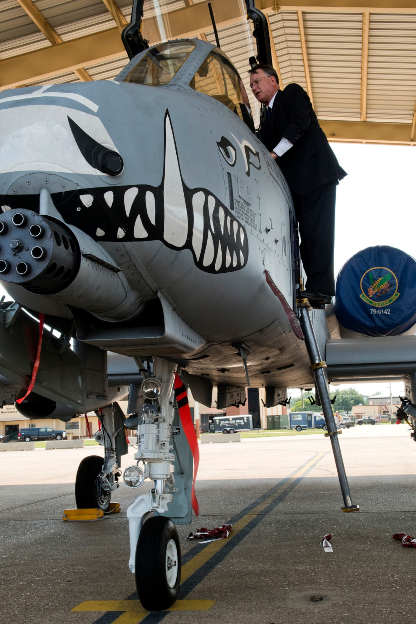 Retired U.S. Air Force Lt. Gen. John Bradley looks in the cockpit of a 47th Fighter Squadron A-10 Thunderbolt II during a visit to Barksdale Air Force Base, La., Aug. 13, 2012. In 1980, this aircraft was flown by Bradley from the Fairchild Republic factory where it was built, to Barksdale when the squadron was transitioning from flying the A-37 Dragonfly to the A-10. (U.S. Air Force photo by Master Sgt. Greg Steele/Released)