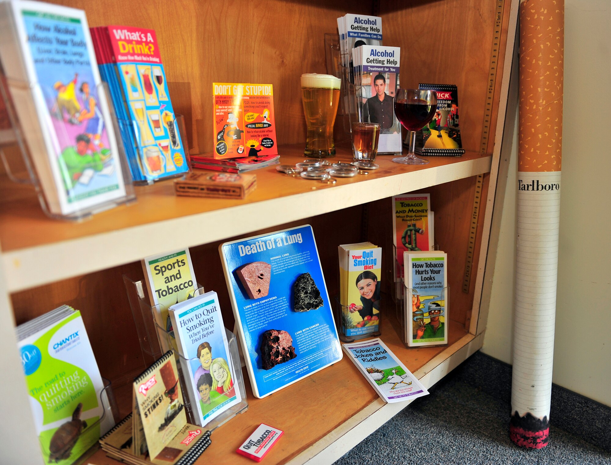 The Health and Wellness Center displays information about tobacco cessation and alcohol awareness in their library on Shaw Air Force Base, S.C., Aug. 9, 2012. The HAWC’s library features many other materials ranging from healthy eating habits to fitness tips free to department of defense card holders. (U.S. Air Force photo by Senior Airman Amber E. N. Jacobs/Released)