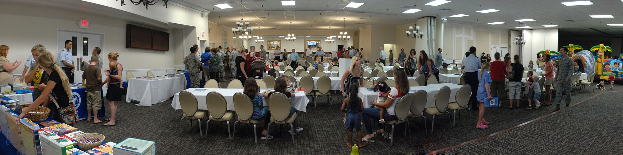 A panoramic view of the main ball room in Carolina Skies, Shaw Air Force Base’s consolidated club, where the 20th Fighter Wing Chapel services host a Deployed Spouses Dinner, S.C. Aug. 13. More than 200 were in attendance. (U.S. Air Force Illustration by Staff Sgt. Ave I. Young/Released)