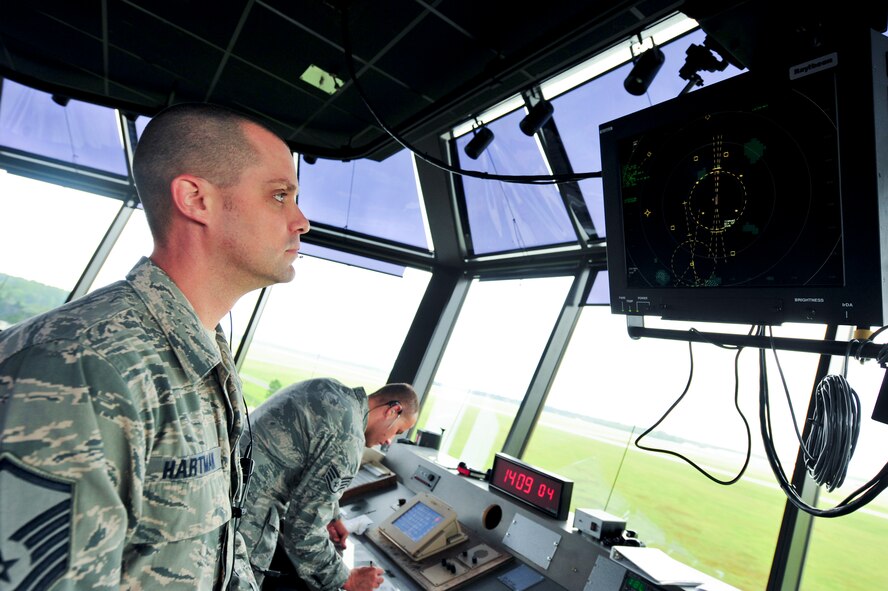 U.S. Air Force Master Sgt. Justin Hartman, 23d Operations Support Squadron assistant chief controller for the tower, monitors a tower display workstation at Moody Air Force Base, Ga., Aug. 12, 2012. The workstation allows air traffic controllers to keep watch on aircraft in the local air space. Air Combat Command awarded Hartman the Lance P. Sijan award. The award is presented to individuals who display leadership capabilities on and off duty. (U.S. Air Force photo by Staff Sgt. Joshua J. Garcia/Released)