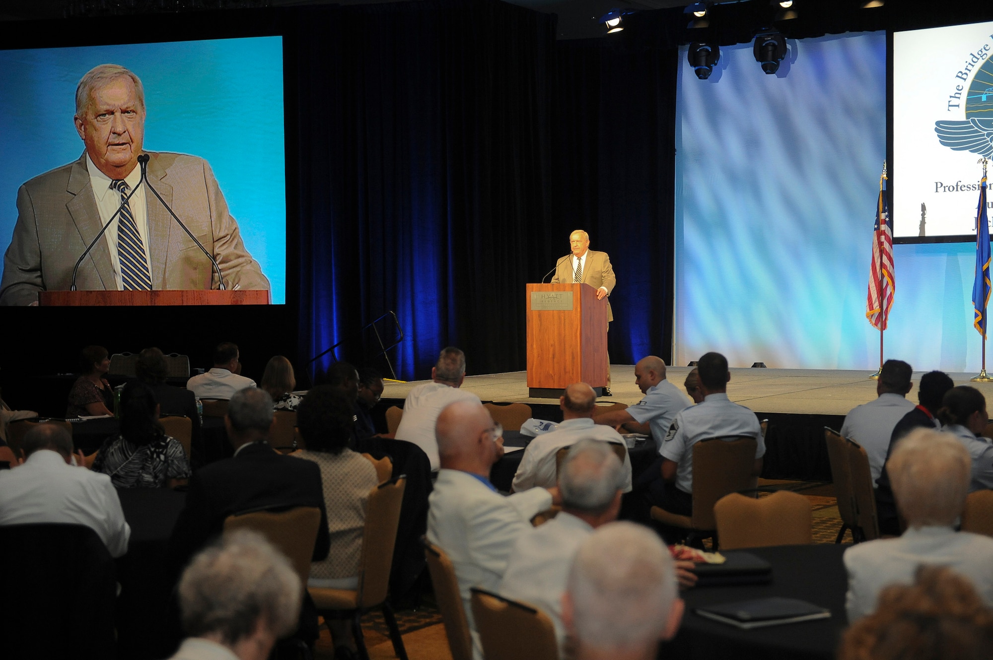 Retired Chief Master Sgt. of the Air Force James Binnicker speaks about the Enlisted Village at the 2012 Professional Airmen's Conference in Jacksonville, Fla., Aug. 12, 2012. Binnicker, the ninth CMSAF, now serves as the president and chief executive officer of the Air Force Enlisted Village, a non-profit charity located in Fort Walton Beach, Fla. The Enlisted Village provides a home for the surviving spouses of enlisted military personnel. (U.S. Air Force photo by Staff Sgt. Ciara Wymbs)