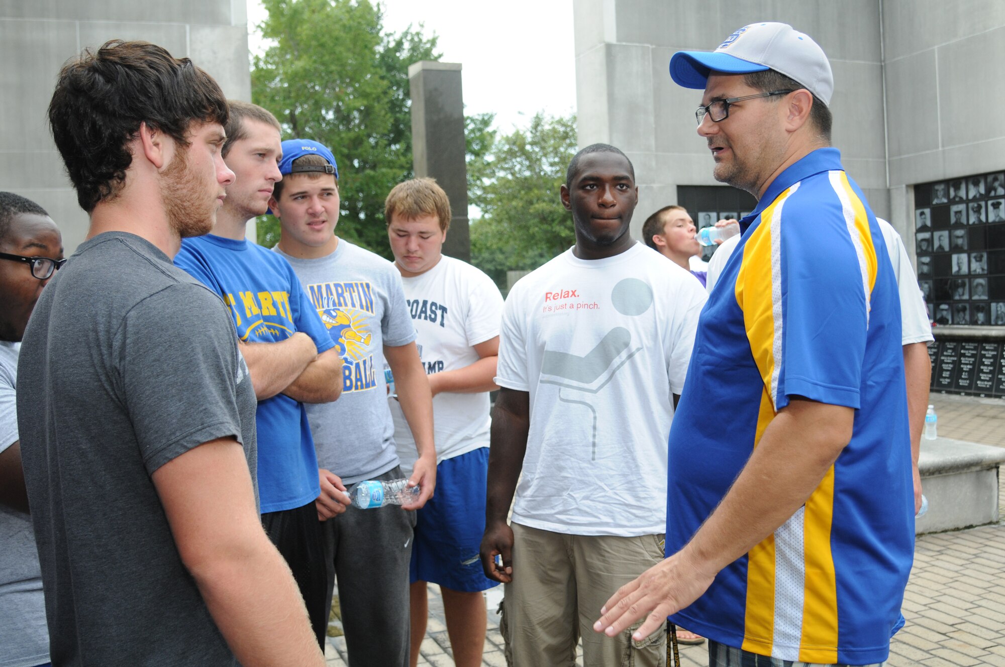 Mr. Rick Crawford, 338th Training Squadron and retired Master Sgt. and president of the St. Martin Gridiron Club, conducted a leadership seminar in which he enforced the importance of teamwork to the senior football players of St. Martin High School Aug. 11, 2012, at the Mississippi Vietnam Veterans Memorial in Ocean Springs.  The seminar was a collaboration of the St. Martin Gridiron Club and members of team Keesler, who also briefed the seniors on good attitudes, values and beliefs.  (Courtesy photo by Kemberly Groue)