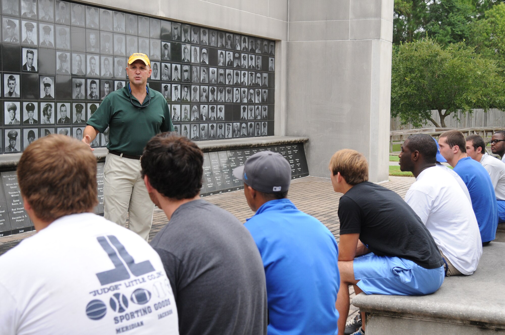 Chief Master Sgt. (retired) Damien Orslene, a veteran who was wounded in Iraq, explains how America needs leaders at all levels, especially in our high schools, and enforces the importance of a positive attitude in all situations to the senior football players of St. Martin High School during a leadership seminar Aug. 11, 2012, at the Mississippi Vietnam Veterans Memorial in Ocean Springs.  The seminar was a collaboration of the St. Martin Gridiron Club and members of team Keesler, who also briefed the seniors on good attitudes, values, beliefs and teamwork.  (Courtesy photo by Kemberly Groue)