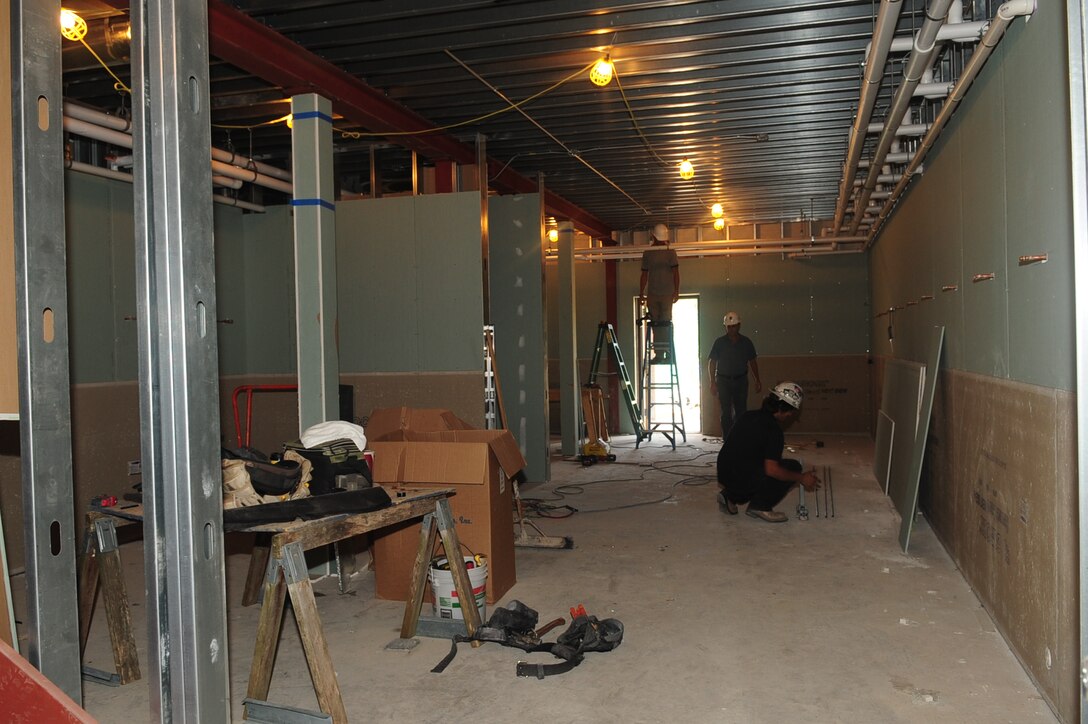 The Anderson Field House racquetball court is being constructed into a two-level room at Fort Eustis, Va., Aug. 9, 2012. The first floor will be an additional locker room, and the second floor will be office space. (U.S. Air Force photo by Staff Sgt. Ashley Hawkins/Released)