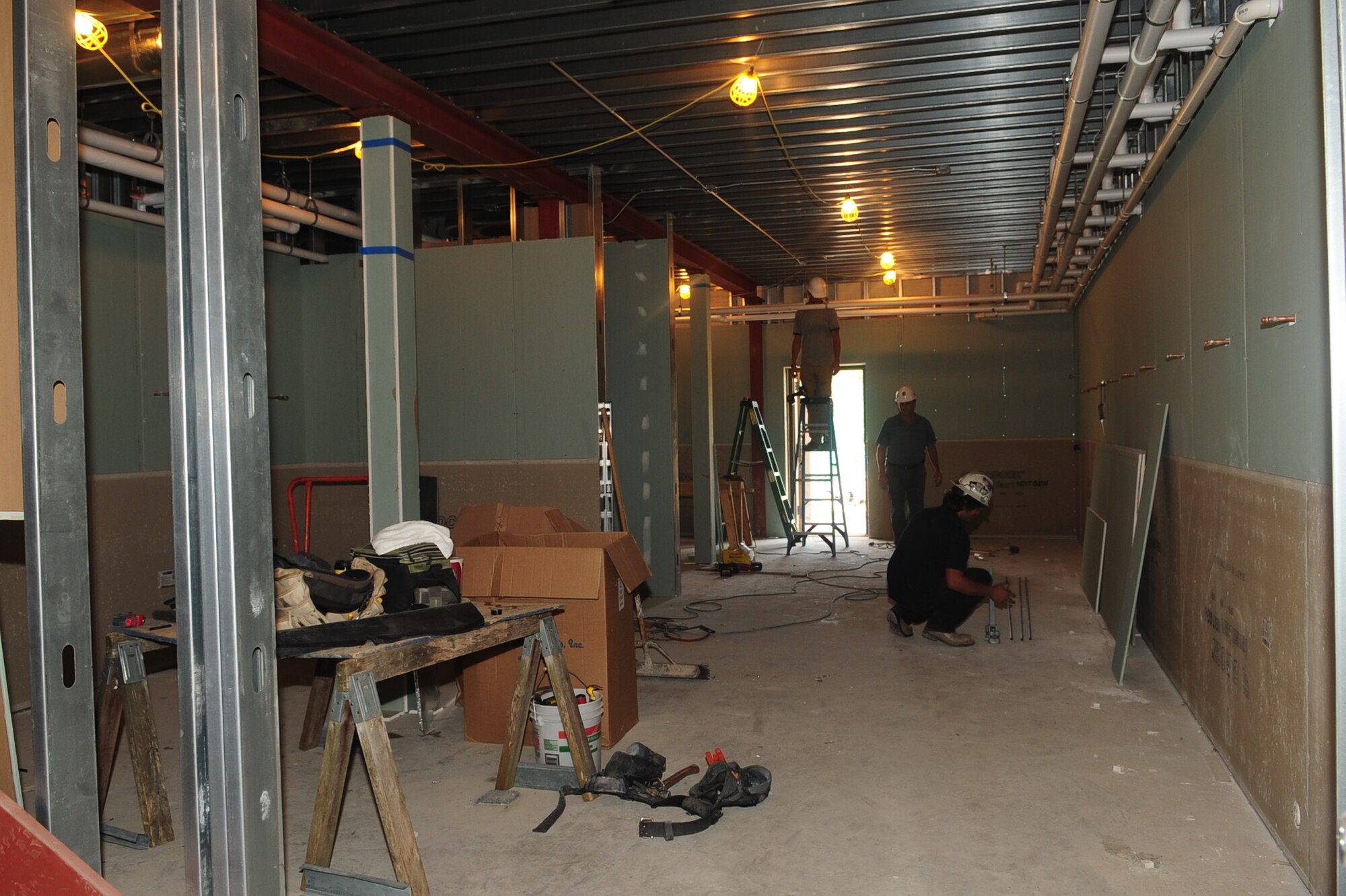 The Anderson Field House racquetball court is being constructed into a two-level room at Fort Eustis, Va., Aug. 9, 2012. The first floor will be an additional locker room, and the second floor will be office space. (U.S. Air Force photo by Staff Sgt. Ashley Hawkins/Released)
