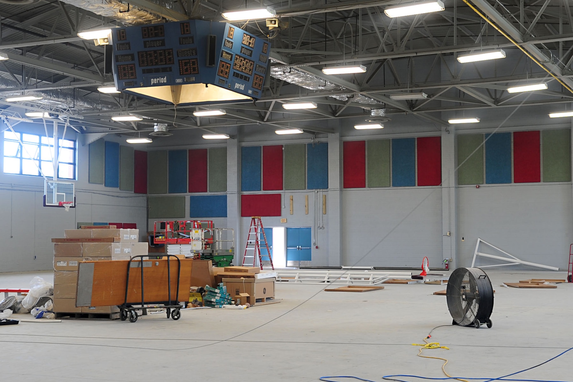 The gym portion of the Anderson Field House awaits completion at Fort Eustis, Va., Aug. 9, 2012. Construction workers are in the process of equipping the gym with heating and air conditioning, motorized bleachers and rubber, multi-purpose flooring. (U.S. Air Force photo by Staff Sgt. Ashley Hawkins/Released)