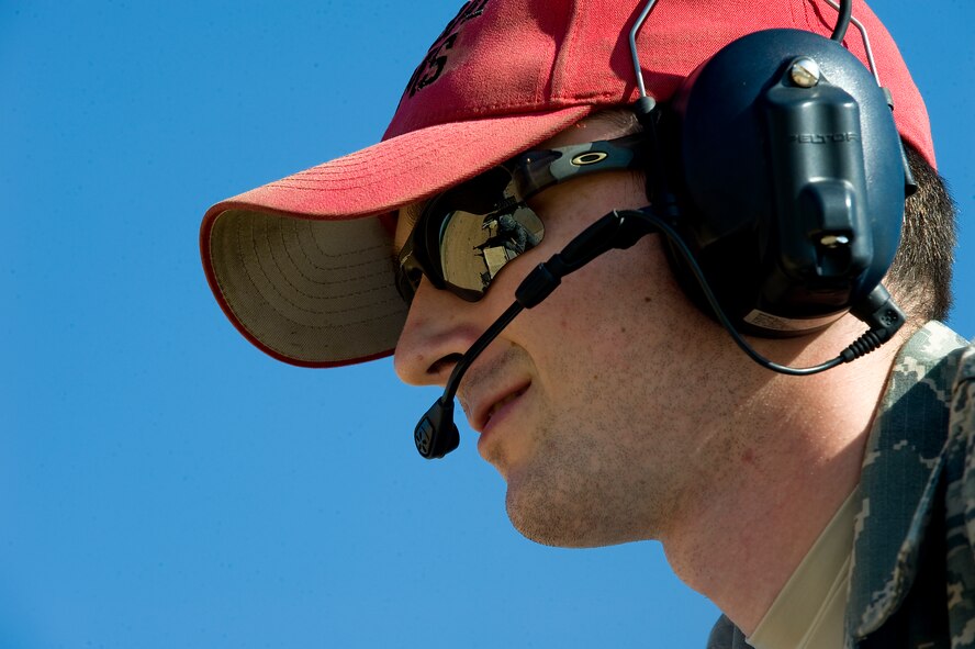 Senior Airman David O’Brien, overlooks an Airman while he fires a M240 machine gun Aug. 10, 2012, during a heavy-weapons qualification course at Camp Bowie, Texas. While at the firing range, Airmen assigned to the 7th Security Forces Squadron shot a M240 machine gun at targets ranging from 25 to 300 meters. The M240 allows servicemembers to place mass amount of fire on an enemy position, suppressing their movement. Prior to firing at the range, Airmen participate in a four-day classroom course, where they learn how to clean, disassemble, reassemble, operate, perform immediate actions and about different types of loads for the weapon.  (U.S. Air Force photo by Airman 1st Class Damon Kasberg/Released)