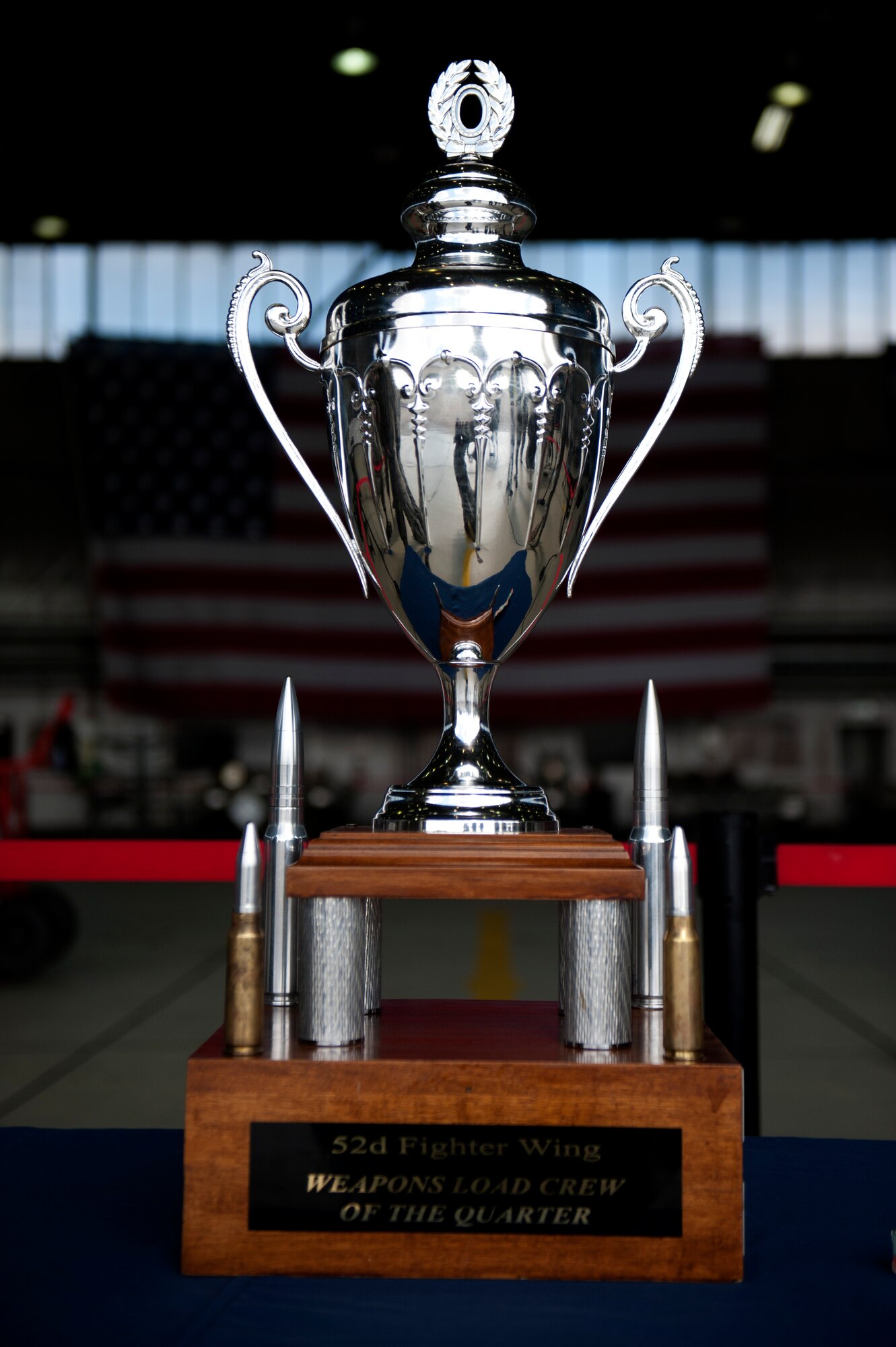 SPANGDAHLEM AIR BASE, Germany – A trophy awarded to the winner of the 52nd Aircraft Maintenance Squadron’s weapons load competition rests on a table here Aug. 10.  The 480th and 81st Aircraft Maintenance Units host and participate in the timed competition once a quarter to see which unit has the fastest and most efficient weapons load crew.  The winners of the competition earn bragging rights as the best crew and a trophy. (U.S. Air Force photo by Airman 1st Class Gustavo Castillo/Released)