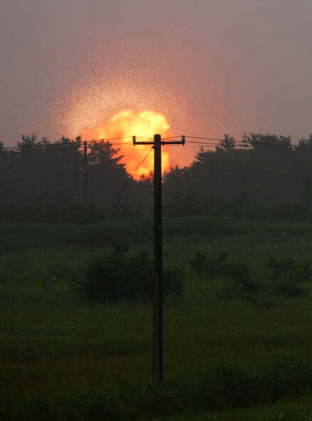 At Draughon Range the 35th Civil Engineer Squadron’s explosive ordnance disposal team disposed of duds in Misawa, Japan, Aug. 13, 2012. To contact the EOD team call 226-3956. (U.S. Air Force photo by Airman 1st Class Kenna Jackson/Released)