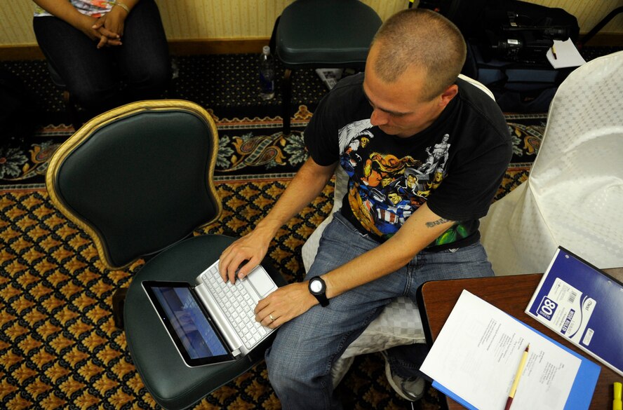 Staff Sgt. Jason Cochran, 8th Logistics Readiness Squadron from Kunsan Air Base, Republic of Korea, video chats with his wife of seven years, Sabrina, during a marriage retreat held at Yongsan Garrison, Aug. 10, 2012. The Kunsan Chapel hosted the retreat as a way for Airmen physically separated from their spouses to still connect with them. (U.S. Air Force photo/Senior Airman Brigitte N. Brantley)