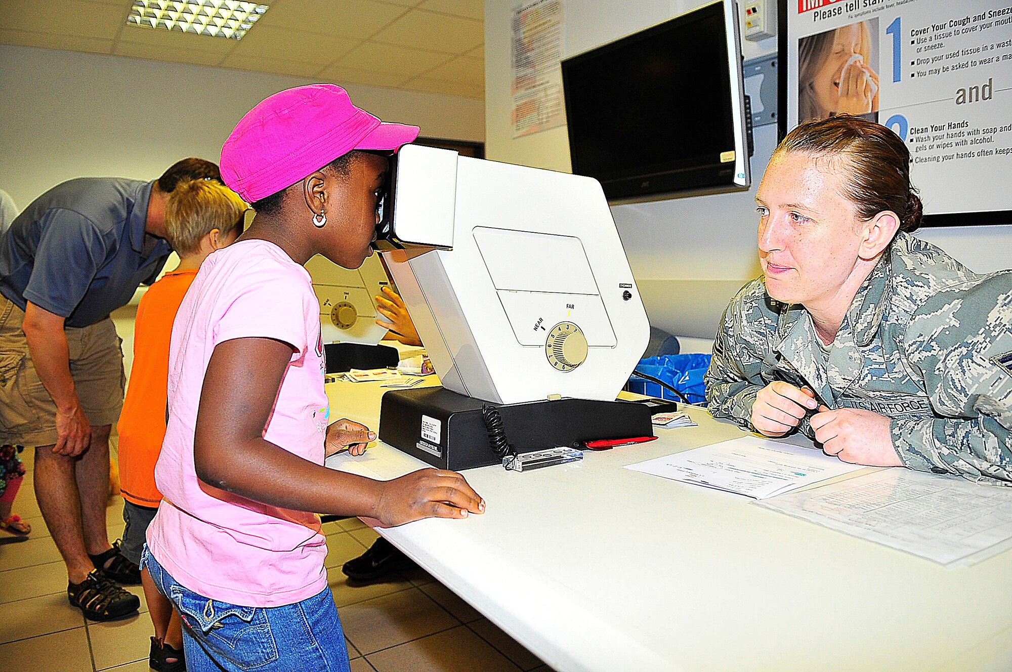The 86th Medical Group hosted a sports physical day at the main clinic on Ramstein Air Base, Germany, August 11, 2012.  Ramstein youth visit each station to complete requirements for school and sports.  (U.S. Air Force photo/Tech. Sgt Daylena Gonzalez)
