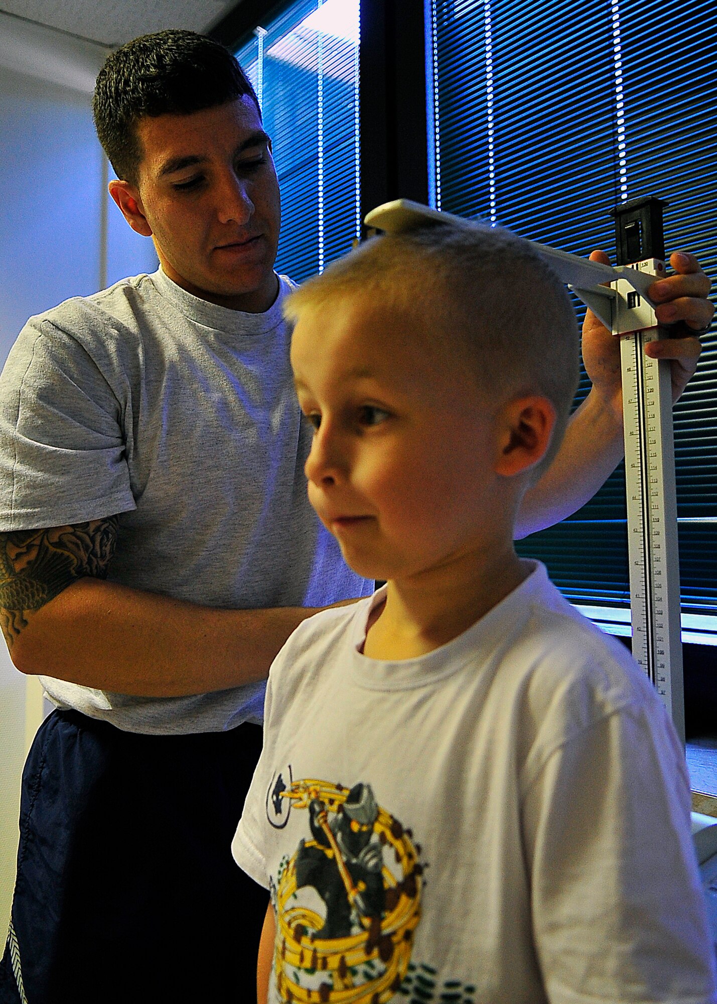 The 86th Medical Group hosted a sports physical day at the main clinic on Ramstein Air Base, Germany, August 11, 2012.  Ramstein youth visit each station to complete requirements for school and sports.  (U.S. Air Force photo/Tech. Sgt Daylena Gonzalez)