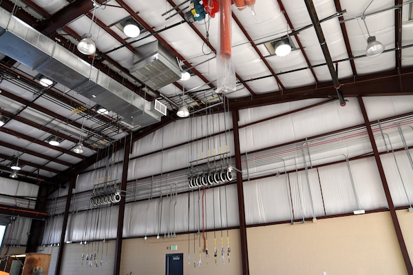 The 12,500-square-foot Organizational Maintenance Shop will provide work bays and offices for several units. Solar tubes light the maintenance, office and common areas in the day time.
