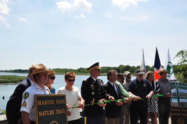 Representatives from the Army Corps of Engineers, New York District, and the New York City Department of Parks took part in a ribbon cutting ceremony to commemorate the completion of the Gerritsen Creek eco-system restoration project. 