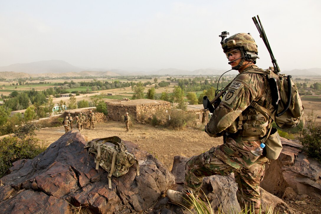 U.S. Army Spc. Jordan Duffy provides security from a hilltop in Black Rock during a patrol in Afghanistan's Khost province, July 31, 2012. Duffy is a forward observer assigned to the 25th Infantry Division's Company A, 1st Battalion, 501st Infantry Regiment, 4th Brigade Combat Team.