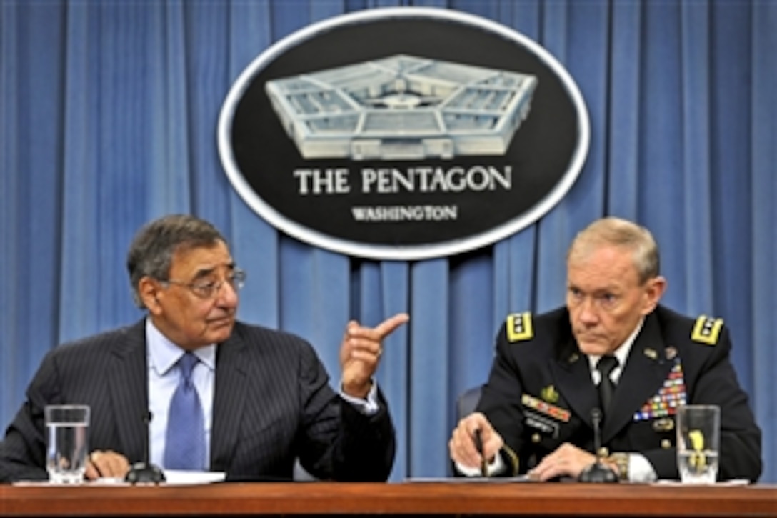 Defense Secretary Leon E. Panetta and Army Gen. Martin E. Dempsey, chairman of the Joint Chiefs of Staff, answer questions during a press briefing at the Pentagon, Aug. 14, 2012.