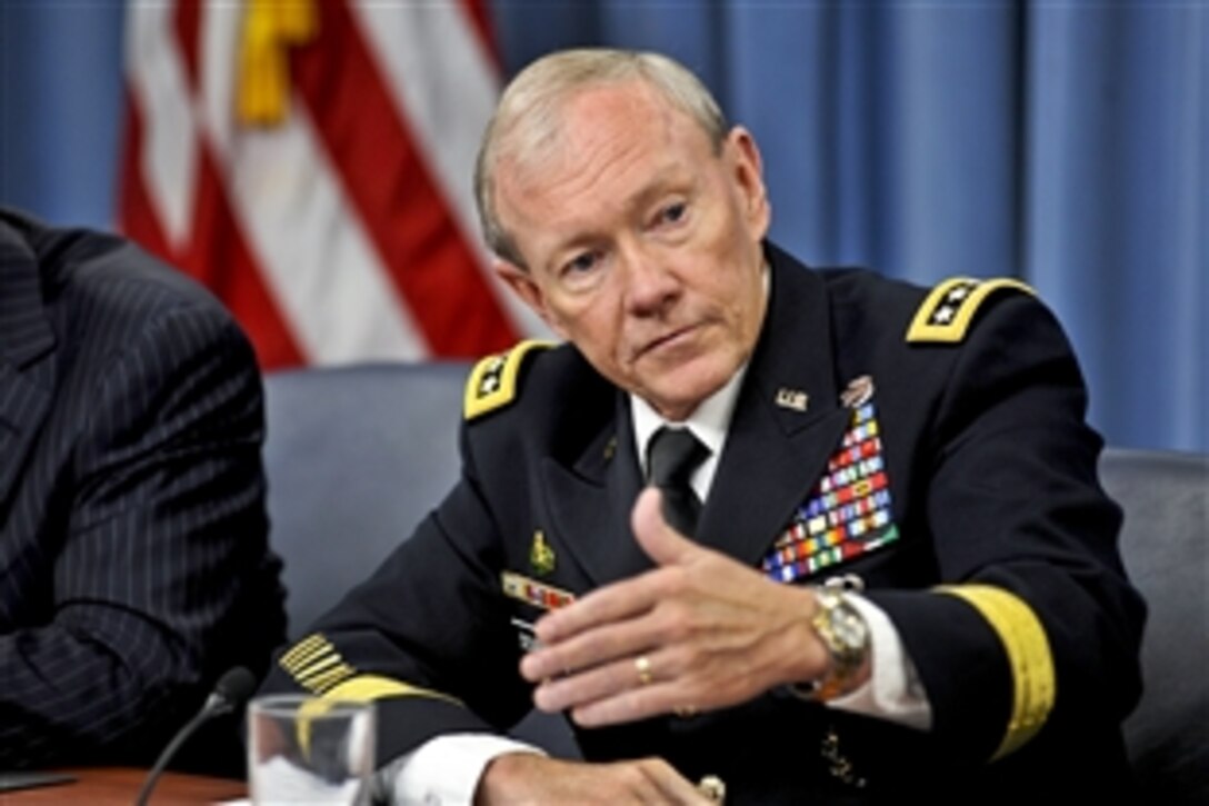 Army Gen. Martin E. Dempsey, chairman of the Joint Chiefs of Staff, answers a question during a press briefing with Defense Secretary Leon E. Panetta at the Pentagon, Aug. 14, 2012. 