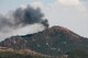 Two HH-60G Pave Hawk helicopters from the 129th Rescue Wing are battling the Jawbone Complex Fire in Kern County, Calif. The aircraft have been based out of the Tehachapi Municipal Airport in Tehachapi, Calif. since Sunday, Aug. 12. (Air National Guard photo/Master Sgt. Julie Avey)