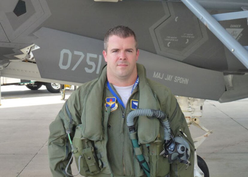 Major Jay Spohn poses for a portrait at Eglin Air Force Base’s 33rd Fighter Wing in front of the F-35A Lightning II bearing his name, after he was the first Guard member to fly the F-35. Spohn is a former pilot with the 188th Fighter Wing, Arkansas Air National Guard. He finished his last of six flights Aug. 3 to become a part of aviation history. He transitioned to the Florida National Guard following his selection as the Guard’s first F-35 aviator. He is now embedded in the 33d Fighter Wing at Eglin Air Force Base where he is responsible for training up the fighter pilots who will fly the fifth-generation F-35 and will carry the U.S. Air Force into the next 50 years of air superiority. (U.S. Air Force photo by Lt. Col. Randall Efferson)