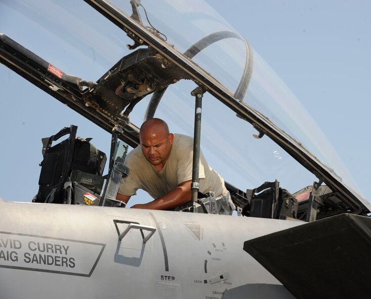 Staff Sgt. Paul Sanchez, assigned to the 366th Aircraft Maintenance Squadron, Mountain Home Air Force Base, Idaho, performs maintenance on an F-15E Strike Eagle on Barksdale Air Force Base, La., Aug. 14. Exercise Green Flag East is not only for the aircrew to practice close air support; it is also for all the support personnel to train and familiarize themselves with inter-service operations. (U.S. Air Force photo/Airman 1st Class Andrew Moua)(RELEASED)