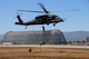 California Air National Guard pararescuemen, assigned to the 131st Rescue Squadron conduct a fast rope egress from an HH-60G Pave Hawk rescue helicopter, Moffett Federal Airfield, Calif., Aug. 8, 2012. This training is being conducted in conjunction with a cadet orientation flight and aircraft profile sensor data collection.  (Air National Guard photo by Staff Sgt. Kim Ramirez/RELEASED)  