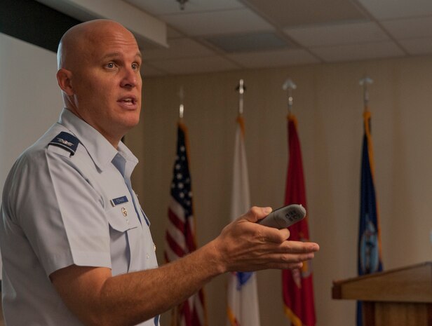 Colonel Charles Perham, Deputy Director, Basing at Office of the Secretary of Defense, Pentagon, Washington, D.C. speaks with Joint Base Charleston leadership Aug. 9, 2012 during his visit to Joint Base Charleston - Air Base, S.C. Perham visited different units of Joint Base Charleston Aug. 8 - 10 on the Air Base and the Naval Weapons Station to discuss matters of Joint Basing. (U.S. Air Force photo/Airman 1st Class Ashlee Galloway)