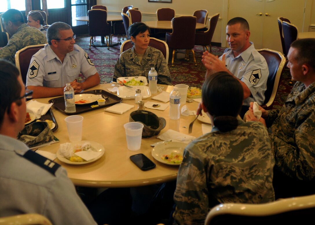 Chief Master Sgt. Patrick Skiver, 779th Medical Group career functional manager, offers his perspective on leadership to members of Andrews’ Company Grade Officer Corps during a professional development luncheon at the Courses at Andrews Aug. 7, 2012. During the luncheon, CGOC members asked Senior NCOs questions about their enlisted leader outlook. (U.S. Air Force photo/Senior Airman Lindsey A. Porter)