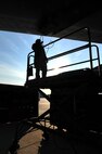 MINOT AIR FORCE BASE, N.D. – Staff Sgt. Brian Bauman, 5th Aircraft Maintenance Squadron weapons load crew member, installs a cable to perform an operational check on the internal conventional weapons system on a B-52H Stratofortress here, Aug. 10. As part of Air Force Global Strike Command, weapons loaders work endlessly to preserve our nation’s security by providing combat-ready forces for nuclear deterrence and global strike operations. (U.S. Air Force photo/Senior Airman Brittany Y. Auld) 