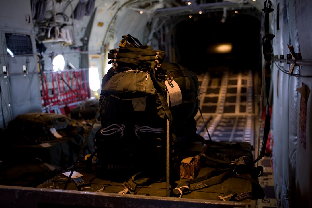 A cargo bundle rigged with a Joint Precision Airdrop System (JPADS) is positioned on a C-130J Super Hercules assigned to the 317th Airlift Group, prior to an airdrop training mission Aug.  14, 2012, at Dyess Air Force Base, Texas.  JPADS is a cargo parachute system that incorporates an onboard global positioning system able to guide the cargo with pinpoint accuracy to a designated drop zone. JPADS also allows cargo to be dropped from higher attitudes, allowing aircraft to safely avoid enemy ground fire. (U.S. Air Force photo by Staff Sgt. Richard P. Ebensberger/ Released)