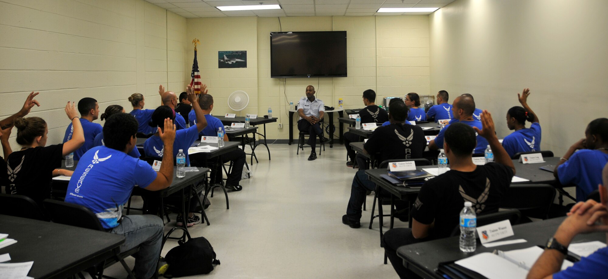 Chief Master Sgt. Cameron Kirksey, 482nd Fighter Wing Command Chief Master Sergeant, addresses the trainees of the Development and Training Flight on the Air Force’s core values and the wingman concept at Homestead Air Reserve Base, Fla., Aug. 12. The Development and Training Flight is a group of trainees who wish to prepare themselves before making their way to basic military training and technical school. The goal of the development and training flight is to reduce the number of seats lost in basic military training and technical school by ensuring all trainees are better prepared for the Air Education and Training Command environment. (U.S. Air Force photo/Senior Airman Jaimi Upthegrove)