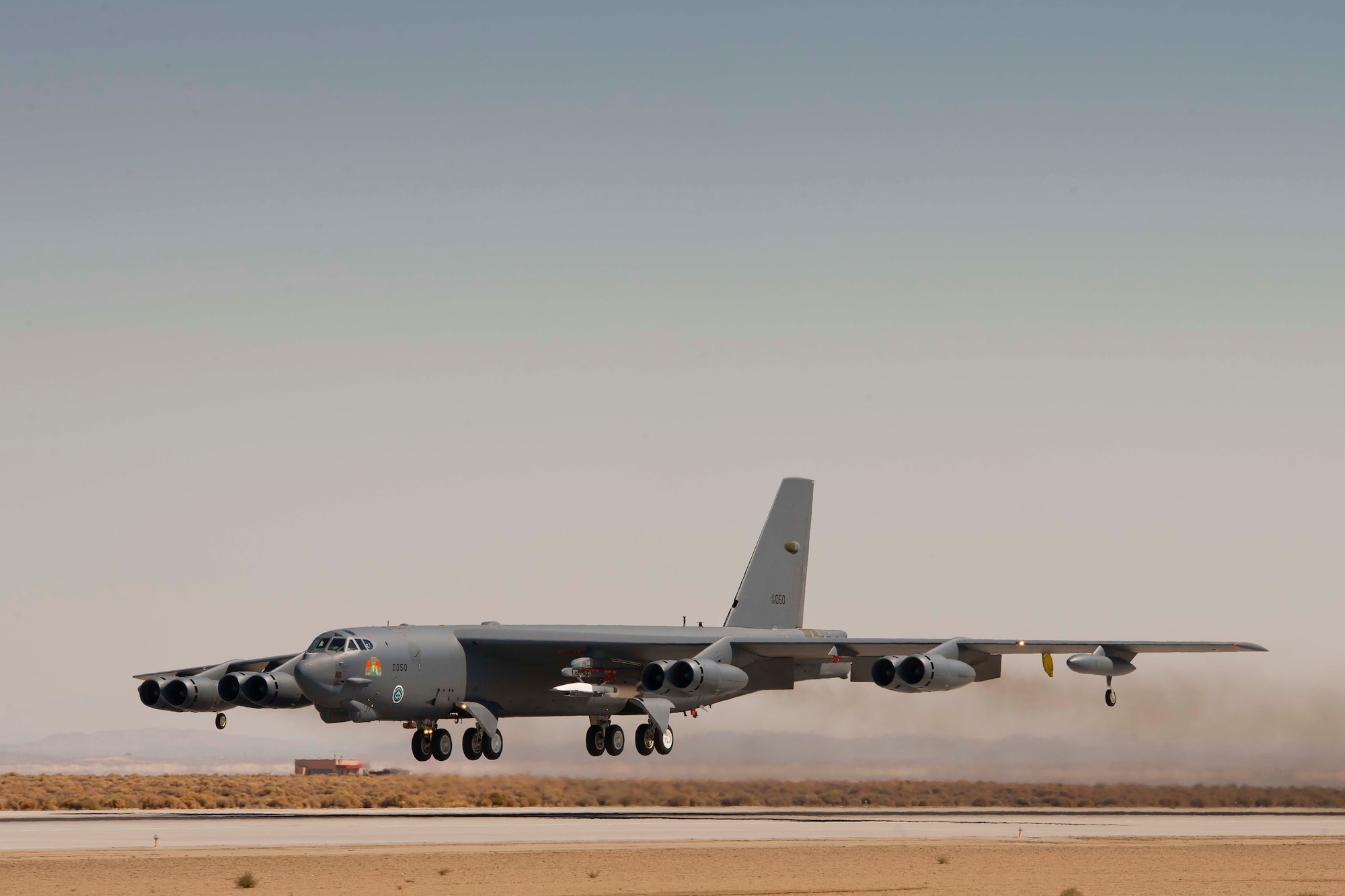 The B-52 carrying the X-51A Waverider takes off from Edwards AFB, Calif., in preparation of the August 14 test flight.  The test ended prematurely when a fault with a control fin caused the vehicle to lose control.  (photo courtesy of Boeing)