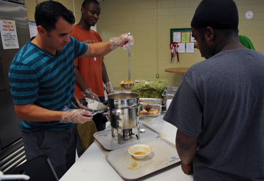 U.S. Air Force Tech. Sgt. Steven Haro, member of the Moody Air Force Base Chapter 460 Air Force Sergeants Association, serves soup while volunteering at the Community Soup Kitchen in Valdosta, Ga., Aug. 14, 2012. AFSA not only participated in the soup kitchen but they arrange recruiting events as well as providing donations to the Air Force Ball. (U.S. Air Force photo by Airman 1st Class Olivia Dominique/Released)