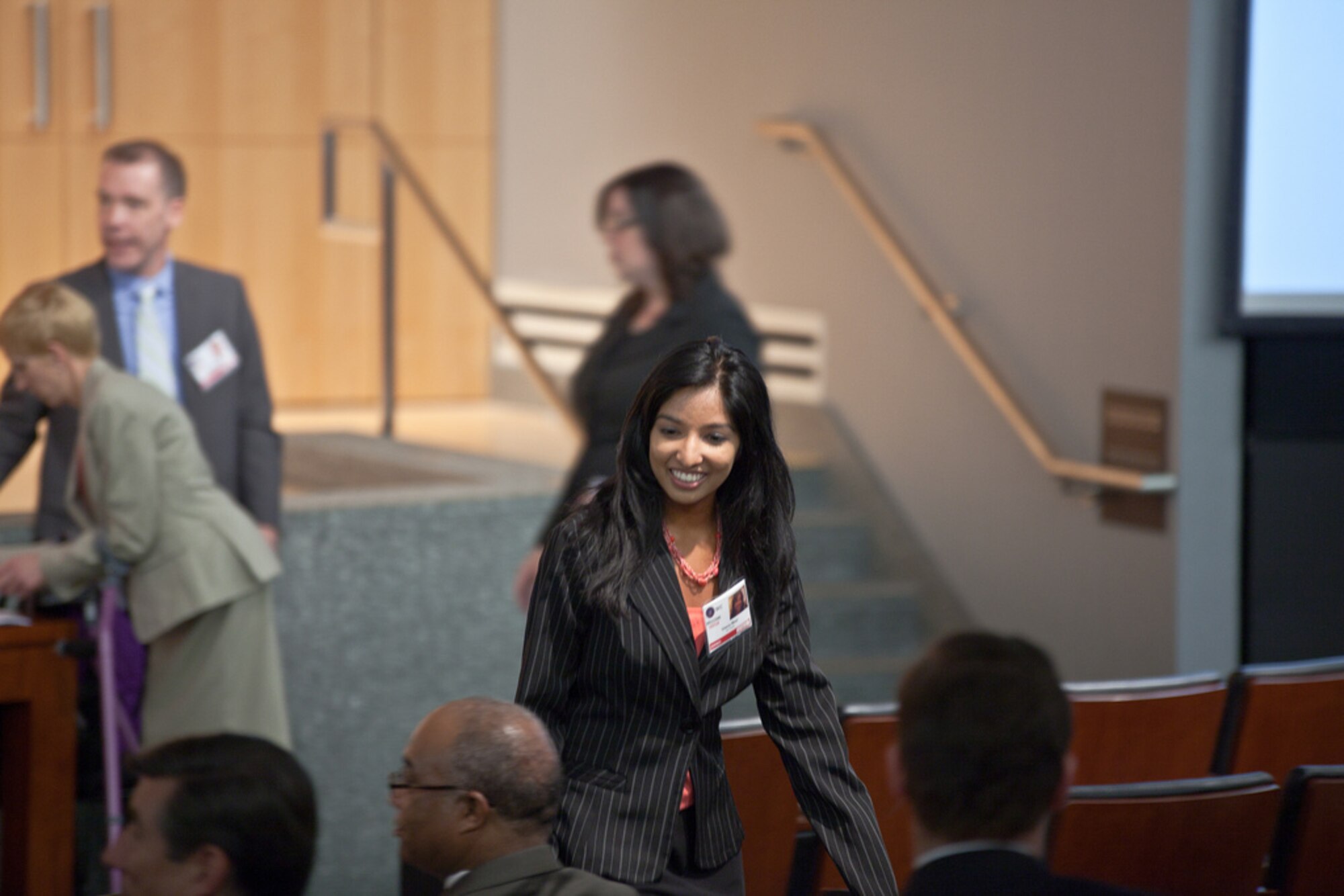 Veena Meer, a student employee with the Air Force Equal Opportunity Office, received a Defense Department award in a ceremony at the Securities and Exchange Commission in Washington, D.C., July 26, 2012. Meer was awarded for her work in promoting the employment of disabled people. She and four others were chosen from a field of 400 students supporting the workforce recruitment program. Her accomplishments include helping to place the highest amount of workforce recruitment program students in Air Force history, increasing the efficiency of screening program candidates, eliminating discrepancies to ensure 100-percent accuracy in the program database and creating exit surveys to gather feedback from those students who declined positions with the program. (Securities and Exchange Commission photo/Scott Weaver)