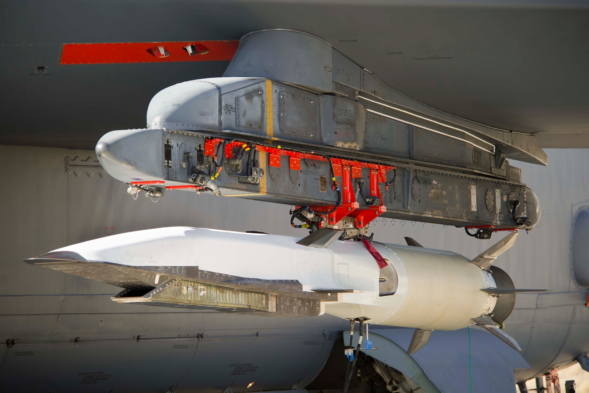 The X-51A Waverider is mounted under the wing of a B-52 at Edwards AFB Calif., in preparation of its August 14 test flight.  On a previous flight, the X-51A  flew for more than three minutes at Mach 4.88 under scramjet power.  (photo courtesy of Boeing)