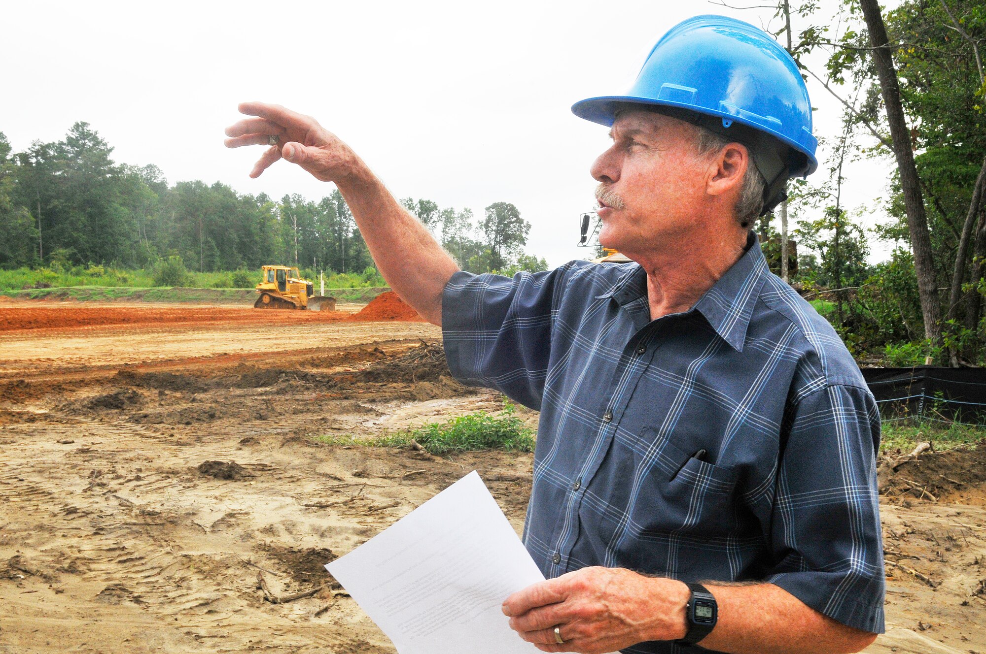 Jeff Hooper, project manager for the  aircraft training pad, talks about the importance of the project to the Robins Aircraft Maintenance Group mission.  (U. S. Air Force photo/Sue Sapp)