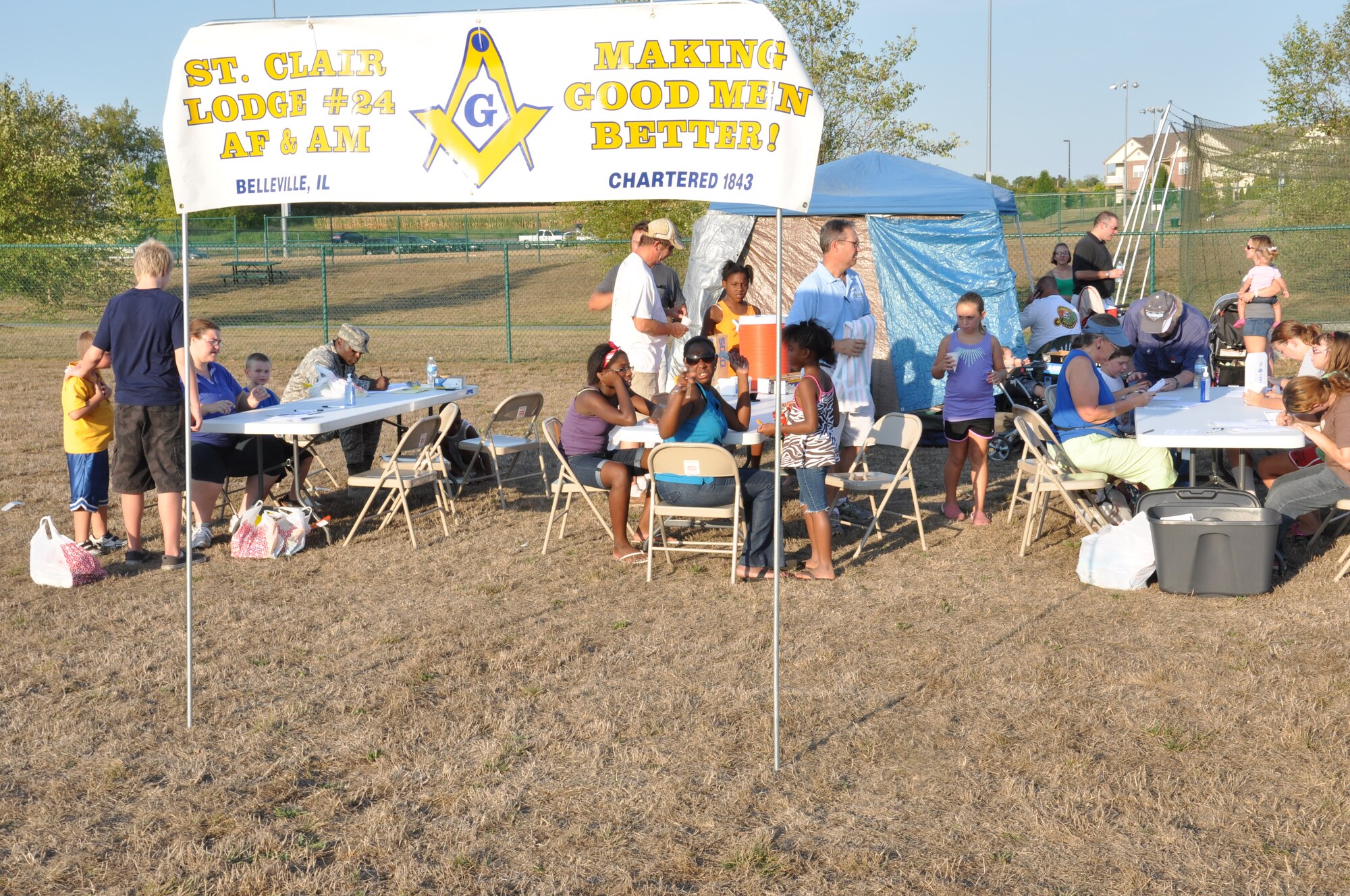 The Freemasons of Illinois and other local businesses came out to the National Night Out to give their support to the community at the Three Springs Park Belleville, Ill. August 7. Businesses in the local area came out with volunteers to give prizes, play music and games, give demonstrations and talk about the importance of local awareness. (U.S. Air Force photo/Airman 1st Class Josh Eikren)