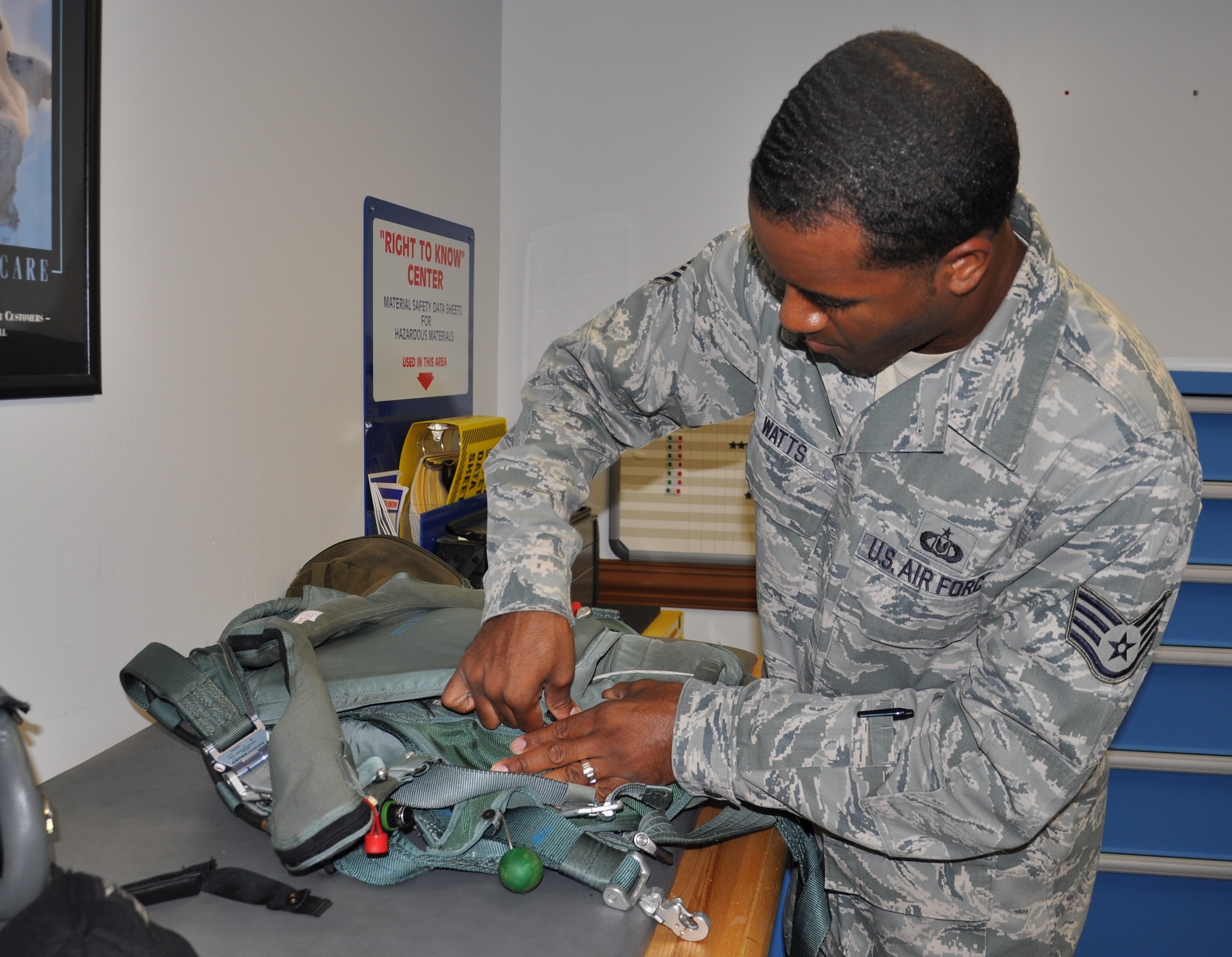 Staff Sgt. Christopher Watts inspects part of a pilot's g-suit. Watts is an aircrew flight equipment technician with the 325th Operations Support Squadron. (U.S. Air Force photo/Staff Sgt. Rachelle Elsea)
