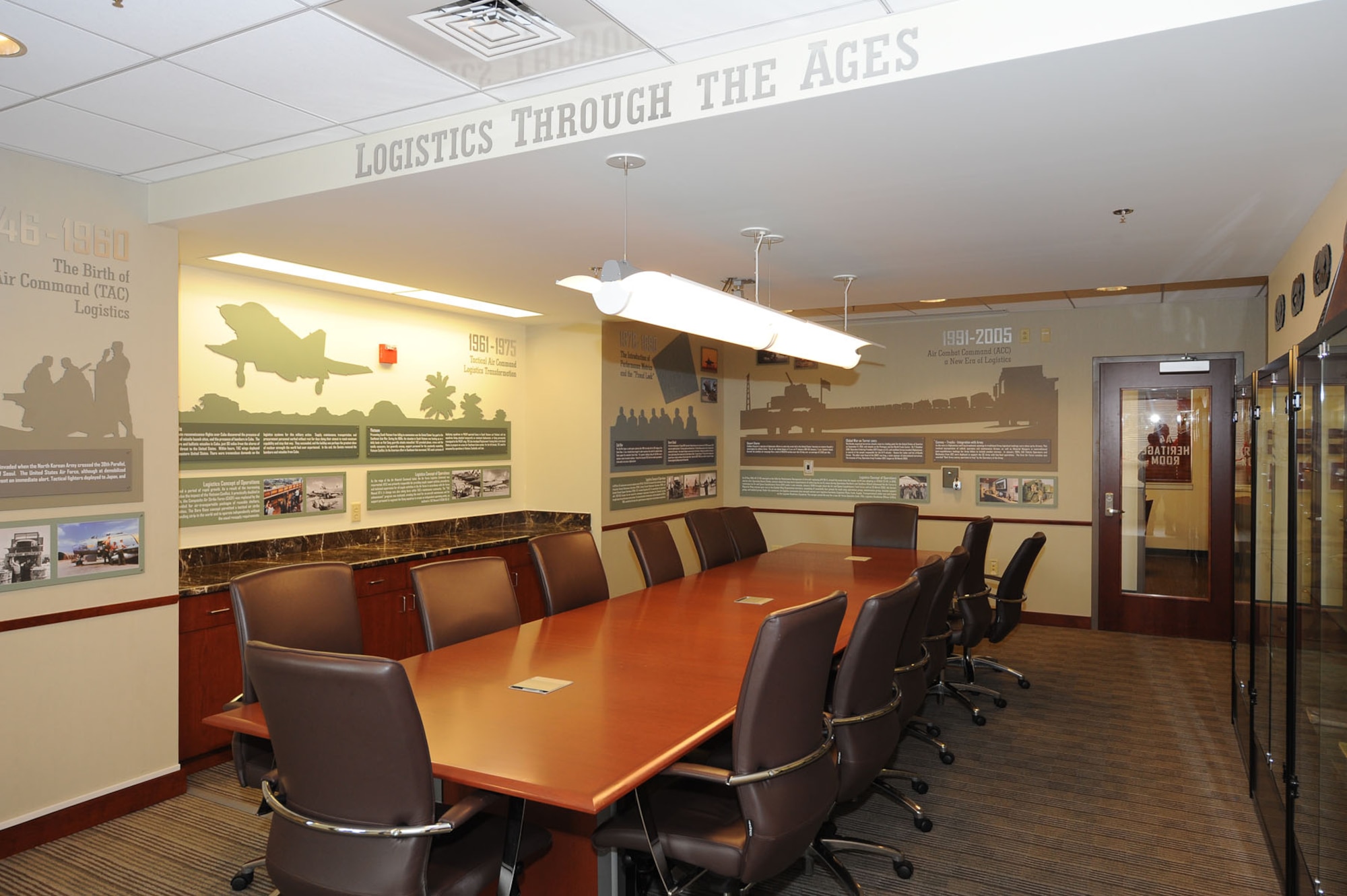 The newly-opened Air Combat Command Logistics Readiness Division Heritage Room features imagery highlighting Air Force logistics history.  U.S. Air Force Maj. Gen. Mark Atkinson, ACC Logistics director, conducted a ribbon cutting ceremony commemorating the room’s completion at Langley Air Force Base, Va., Aug. 10, 2012. (U.S. Air Force photo by Tech. Sgt. Barry Loo/Released)