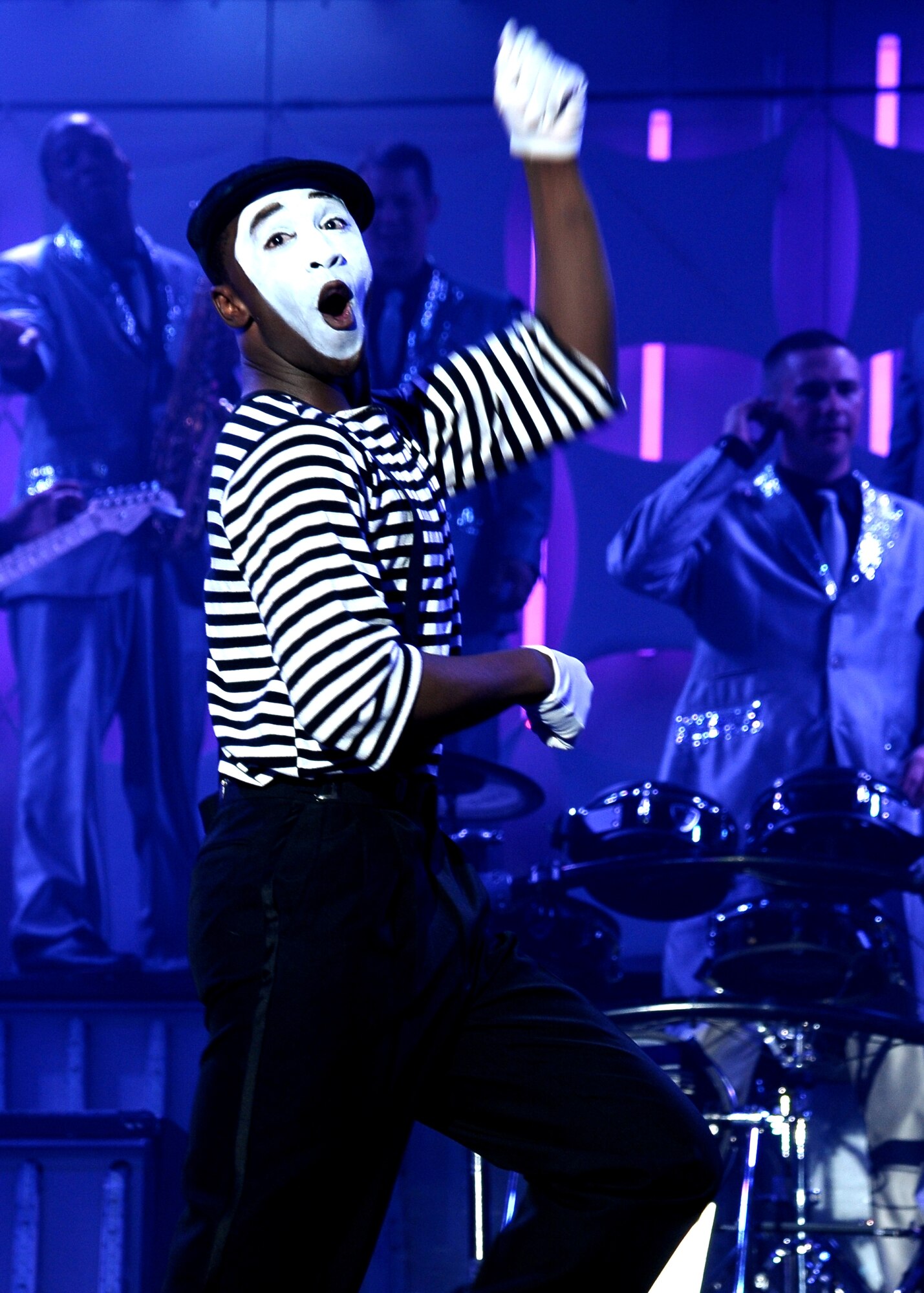 Senior Airman Charles Cooper, Tops in Blue 2012 vocalist, performs an act as a mime in the Tops in Blue “Listen!” 2012 World Tour Aug. 11 in Columbus, Miss.  After the competitive selection process those chosen for the Tops in Blue team must attend 60 days of training to hone their skills and prepare them for the tour ahead. (U.S. Air Force Photo/Airman 1st Class Charles Dickens)