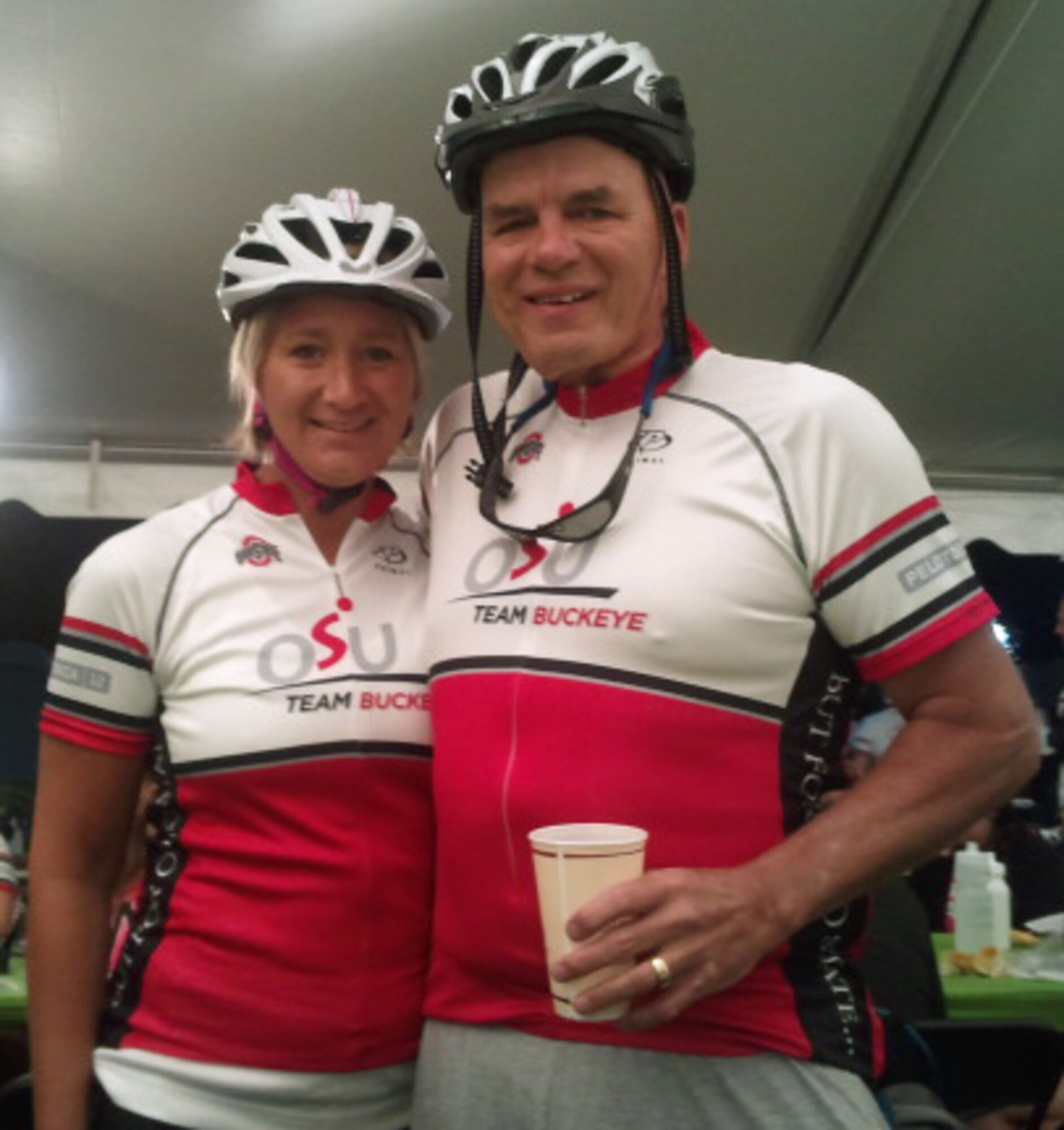 Valerie Busdeker, 497th Intelligence, Surveillance and Reconnaissance Group executive assistant, and her father-in-law and cancer survivor, Sam Legg Jr., prepare for Pelotonia Ride 2012, a 100-mile bicycle ride conducted in Ohio, Aug. 11.  Busdeker’s team, Buckeye, raised more than $50,000 for cancer research. (Photo courtesy of Valerie Busdeker/Released)