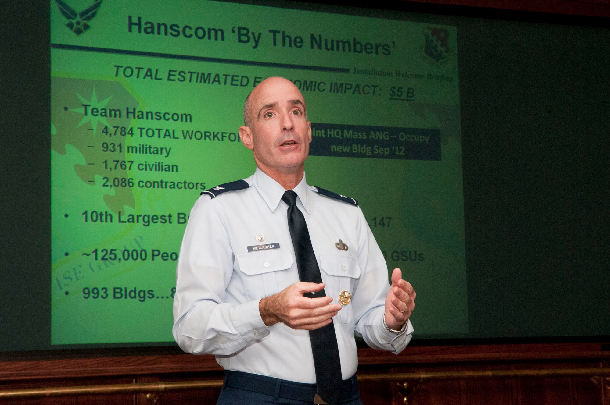 HANSCOM AIR FORCE BASE, Mass. – Col. Lester A. Weilacher, 66th Air Base Group commander, speaks to attendees during the Installation Commander’s Welcome at the Hanscom Conference Center July 23. The commander’s welcome is one of three upcoming opportunities available to all base newcomers. (U.S. Air Force photo by Mark Wyatt)