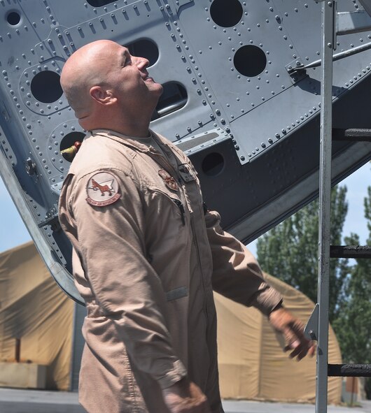 Master Sgt. Eric Faurott, 22nd Expeditionary Air Refueling Squadron boom operator, loads bags before a refueling flight over Afghanistan, Aug. 2, 2012. Faurott has been in the military for 27 years and is a native of Kapolei, Hawaii. The 22nd EARS provides aerial refueling support to Air Force, Navy, Marine Corps and allied nation aircraft in support of Operation Enduring Freedom. (U.S. Air Force photo/Staff Sgt. Alexandria Mosness)

