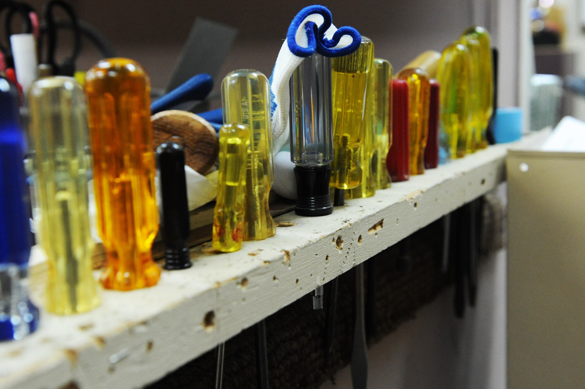 Tools line a work bench in The Frame Shop at Misawa Air Base, Japan, Aug. 15, 2012. The shop is part of the Arts and Crafts Annex and is located across from the Torii Building. For more information on services the shop provides contact them at 226-4371.(U.S. Air Force photo by Airman 1st Class Kia Atkins/Released)