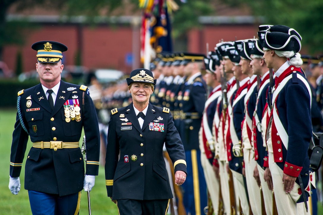 Army Gen. Ann E. Dunwoody, former commanding general of the Army Materiel Command, and Army Col. James C. Markert inspect troops during Dunwoody’s retirement ceremony on Joint Base Myer-Henderson Hall in Arlington, Va., Aug. 15, 2012. Dunwoody, the first woman in the U.S. military to achieve the rank of four-star general, retired after 38 years of service. Markert commands the 3rd U.S. Infantry Regiment known as "The Old Guard."