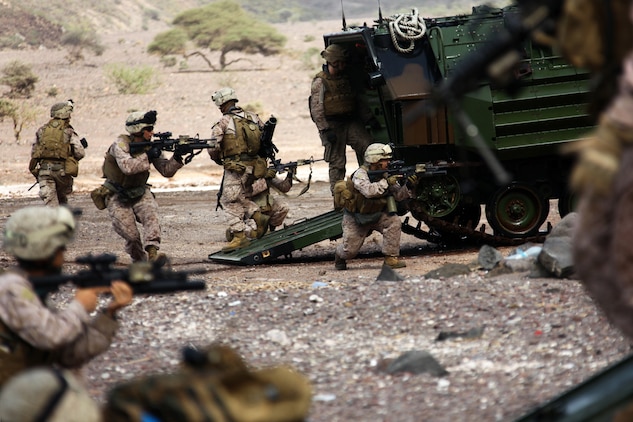 Marines with Alpha Company, Battalion Landing Team 1st Battalion, 2nd Marine Regiment, 24th Marine Expeditionary Unit, assault a beachhead during an amphibious training raid in Djibouti, Aug. 15, 2012. Elements of the 24th MEU are operating in and around Djibouti, taking part in and coordinating various unilateral exercises and bilateral events with foreign militaries. The 24th MEU is deployed with the Iwo Jima Amphibious Ready Group as a theater reserve and crisis response force in support of U.S. Central Command and the U.S. Navy's 5th Fleet area of responsibility. (U.S. Marine Corps photo by Cpl. Michael Petersheim)