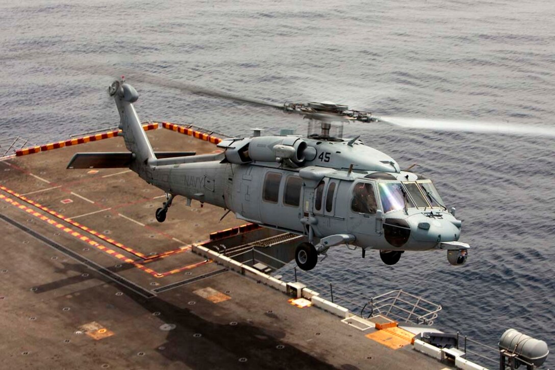 A MH-60 Knight Hawk with Combat Helicopter Squadron 23, takes off from the flight deck of the USS Peleliu, August 15. The 15th MEU is underway for Certification Exercise, its final training before deployment. The MEU already conducted two other at-sea periods that focused on skills sets pertaining to the missions a MEU may face while forward deployed.  The CERTEX is different than previous exercises though; it is a blind exercise, Marines and sailors will not know what to expect and will have to react quickly using the Marine Corps’ Rapid Response Planning Process to prepare for the missions the unit will execute.