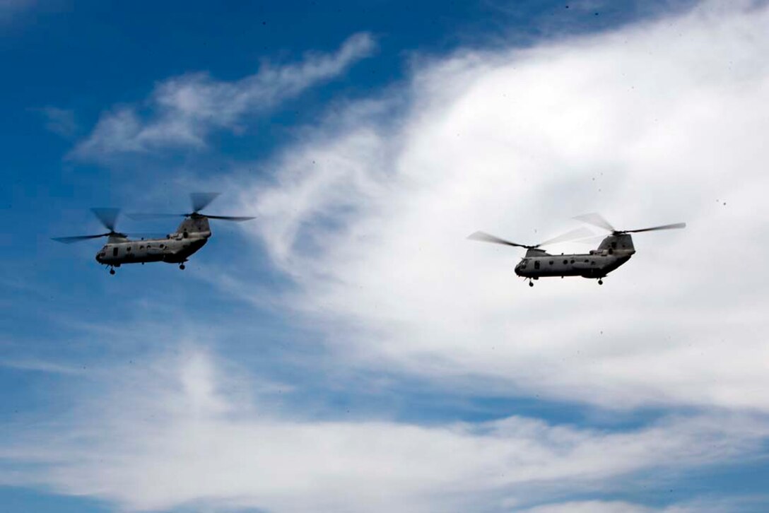 CH-46E Sea Knights with Marine Medium Helicopter Squadron 364 (REIN), 15th Marine Expeditionary Unit, prepare to land on the flight deck of the USS Peleliu, August 15. The 15th MEU is underway for Certification Exercise, its final training before deployment. The MEU already conducted two other at-sea periods that focused on skills sets pertaining to the missions a MEU may face while forward deployed.  The CERTEX is different than previous exercises though; it is a blind exercise, Marines and sailors will not know what to expect and will have to react quickly using the Marine Corps’ Rapid Response Planning Process to prepare for the missions the unit will execute.