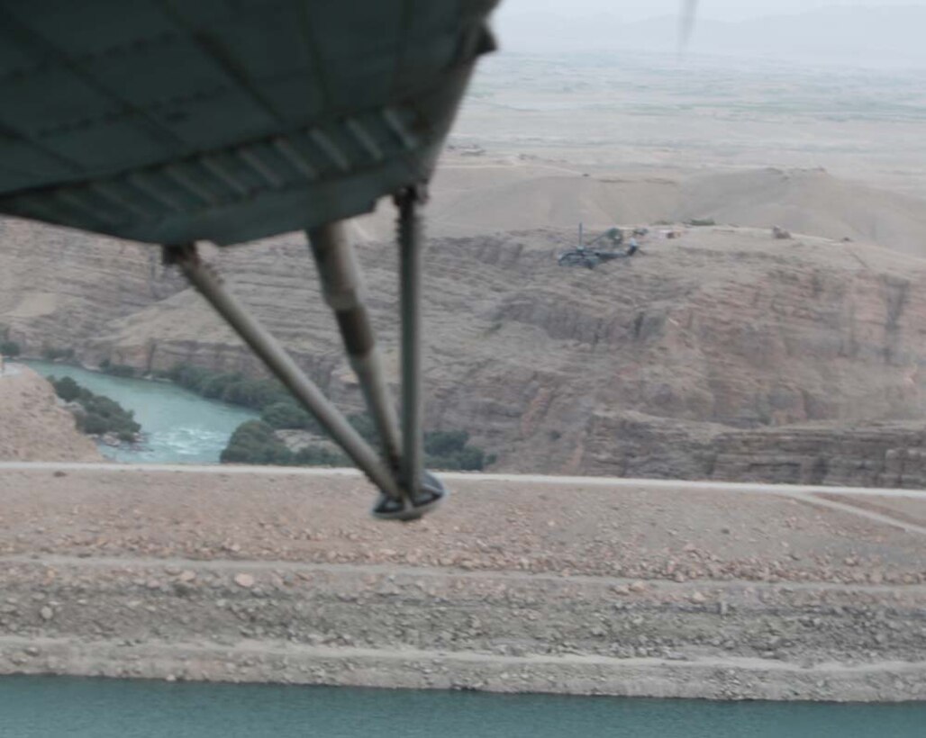 Marines with Marine Heavy Helicopter Squadron 466, 3rd Marine Aircraft Wing (Forward), fly over the Kajaki Dam, Aug. 14. Marine Heavy Helicopter Squadron 466, composed of East and West coast Marines, have supported missions in Helmand and Nimruz provinces for the past seven months.